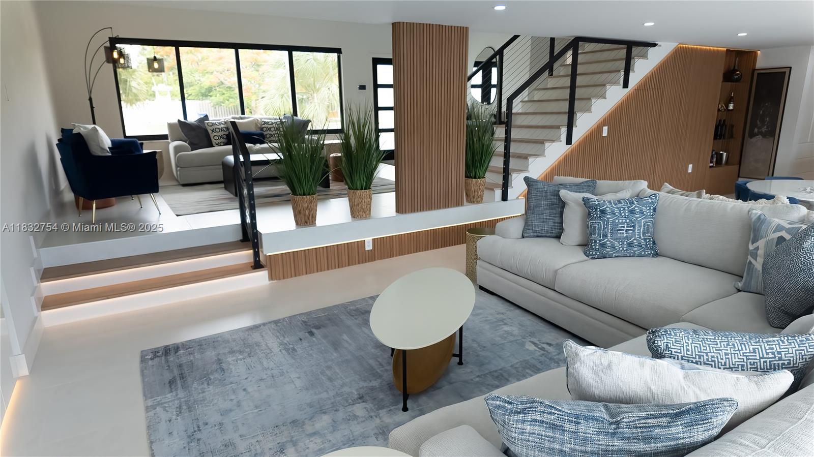 1240 Northeast 27th Terrace Pompano Beach, FL 33062 - Photo 80 of 98 a living room with furniture and a large window