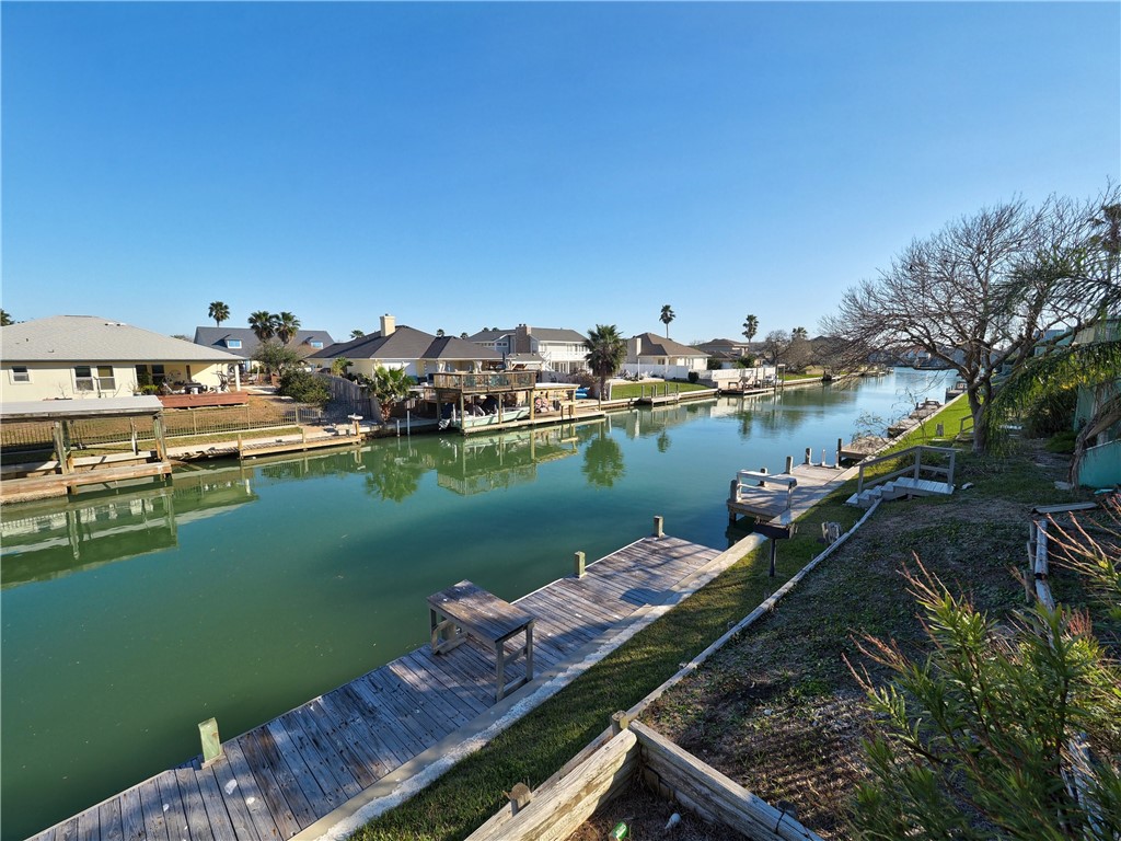 14300 Aloha Street, Unit 151 Corpus Christi, TX 78418 - Photo 16 of 33 a view of a lake with a city