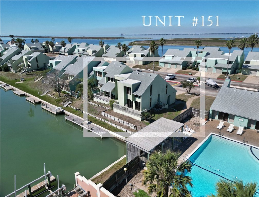 14300 Aloha Street, Unit 151 Corpus Christi, TX 78418 - Photo 32 of 33 a view of multiple houses with outdoor space