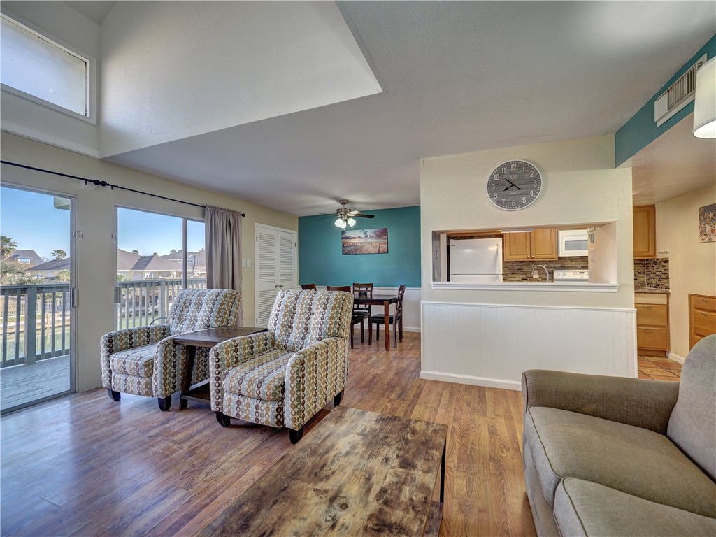 14300 Aloha Street, Unit 151 Corpus Christi, TX 78418 - Photo 4 of 33 a living room with furniture and windows