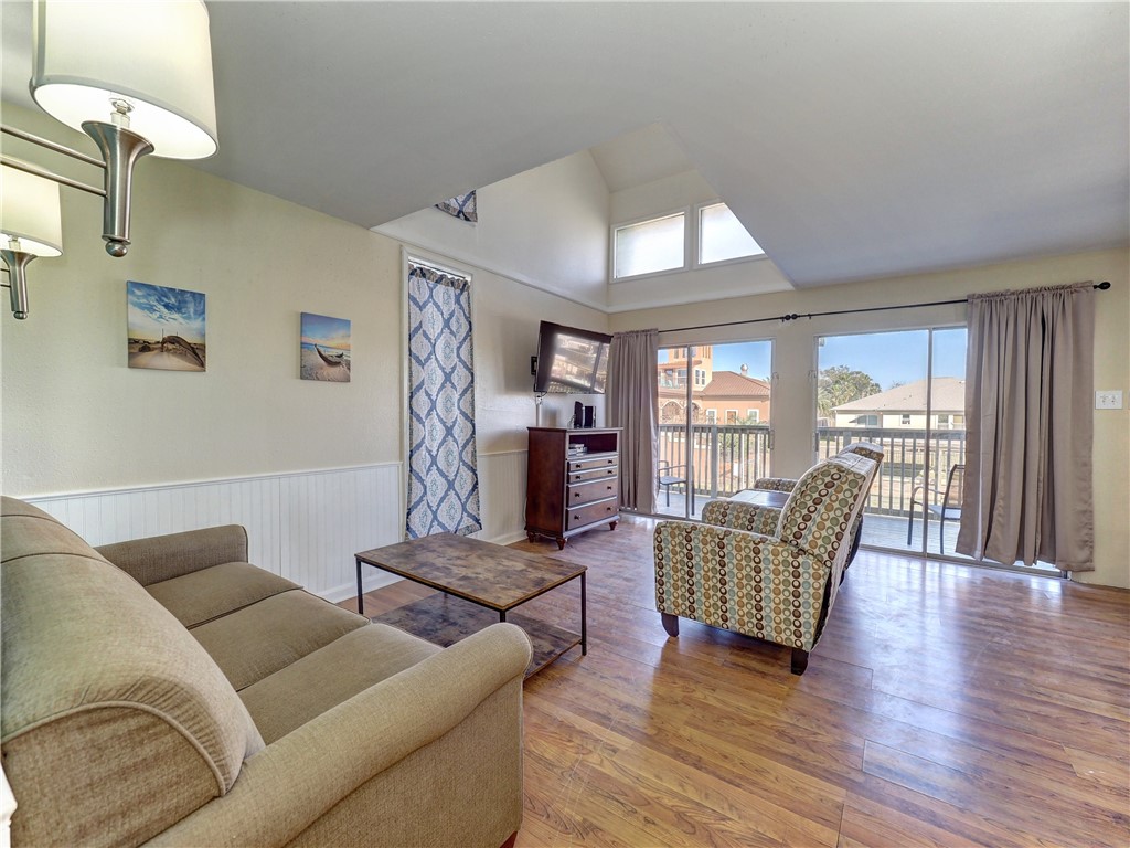 14300 Aloha Street, Unit 151 Corpus Christi, TX 78418 - Photo 6 of 33 a living room with furniture and a window