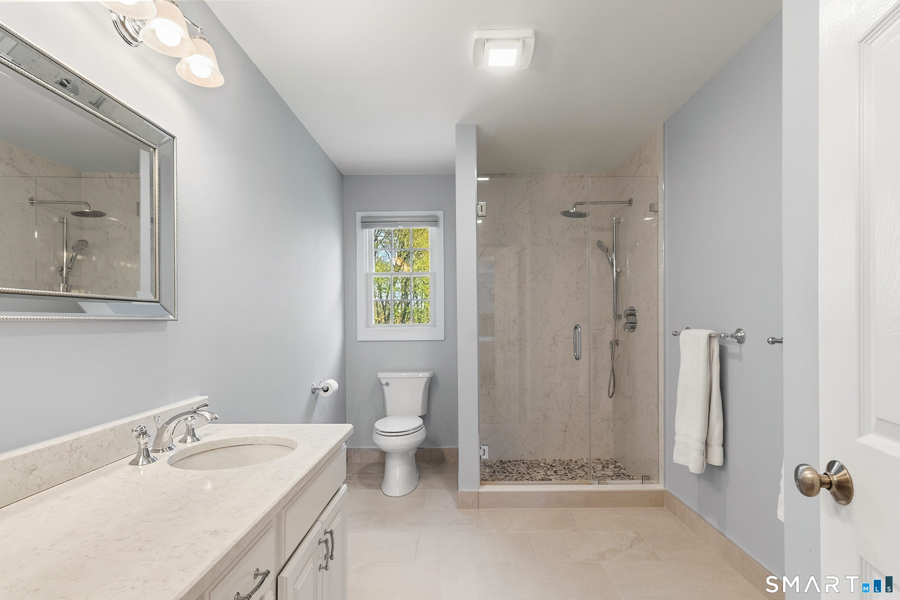 45 Beardsley Road New Milford, CT 06776 - Photo 22 of 40 beautiful primary bathroom updated with a stand-up shower and new tile flooring.