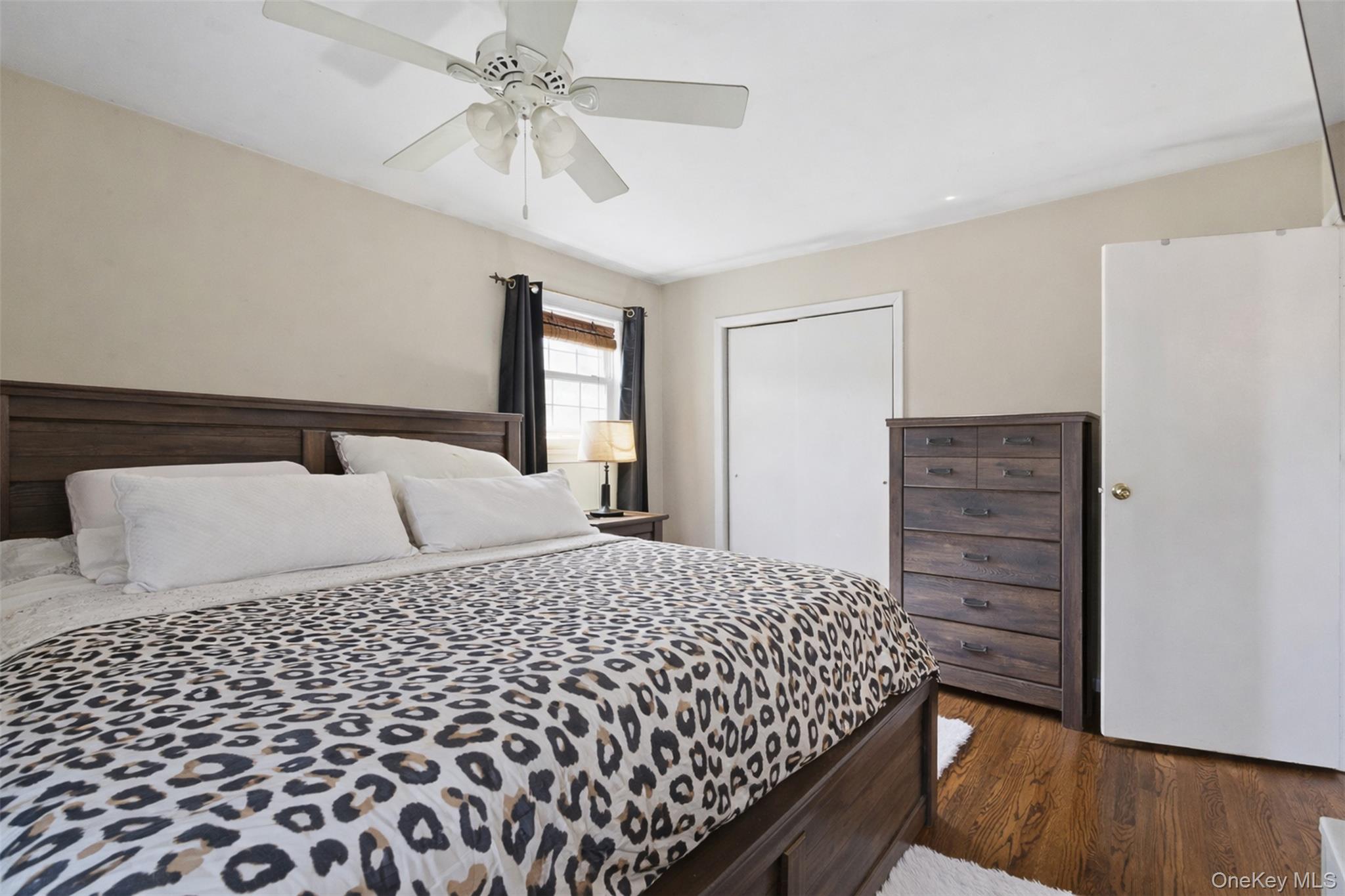 67 High Ridge Road Monroe, NY 10950 - Photo 15 of 34 a bedroom with a bed and wooden floor