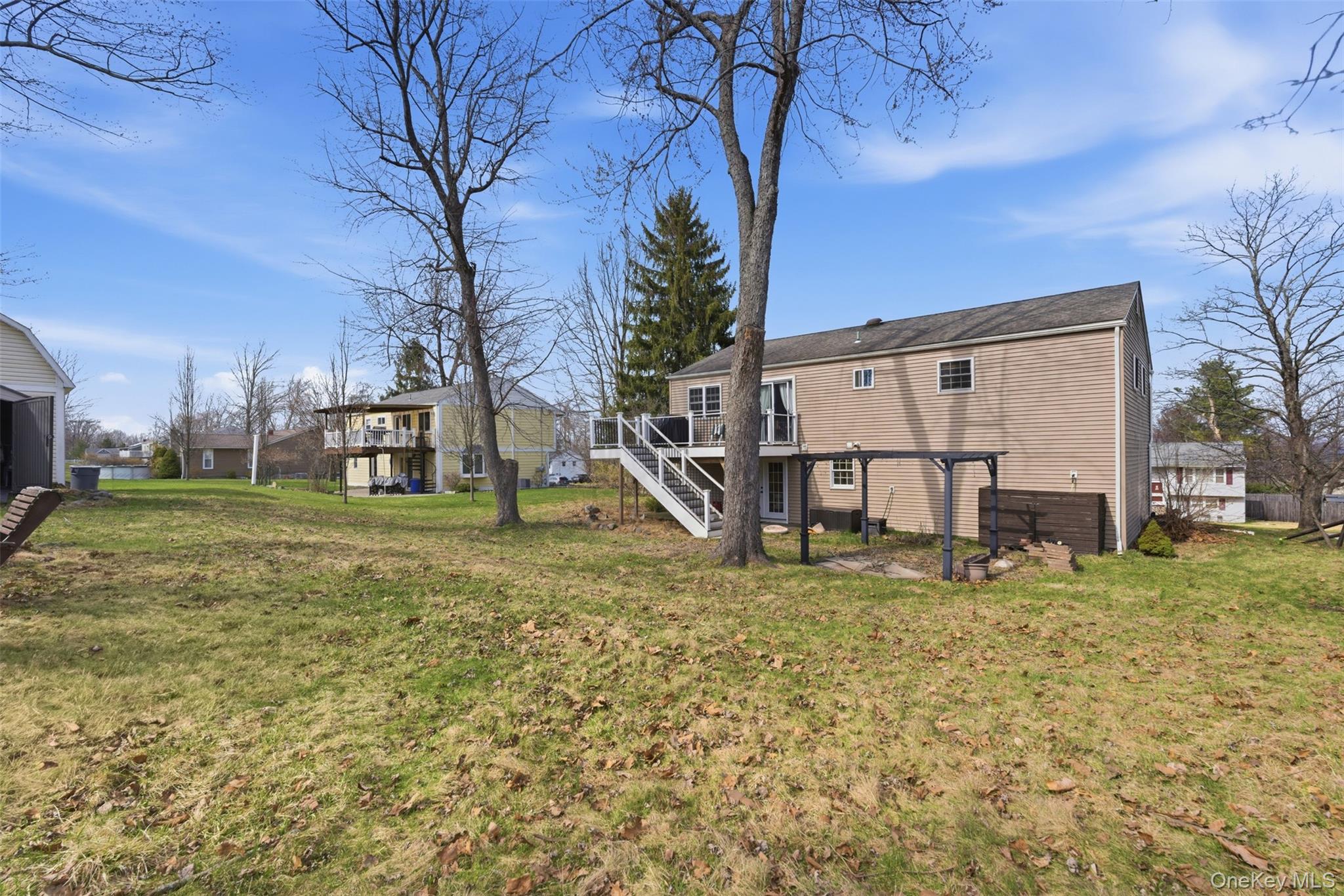 67 High Ridge Road Monroe, NY 10950 - Photo 33 of 34 a view of a house with a yard