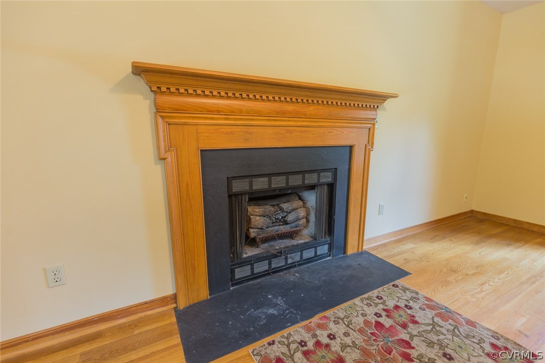 6202 Husting Road Chesterfield, VA 23832 - Photo 11 of 50 a living room with a fireplace