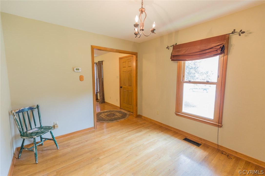 6202 Husting Road Chesterfield, VA 23832 - Photo 14 of 50 a view of a room with a windows and wooden floor