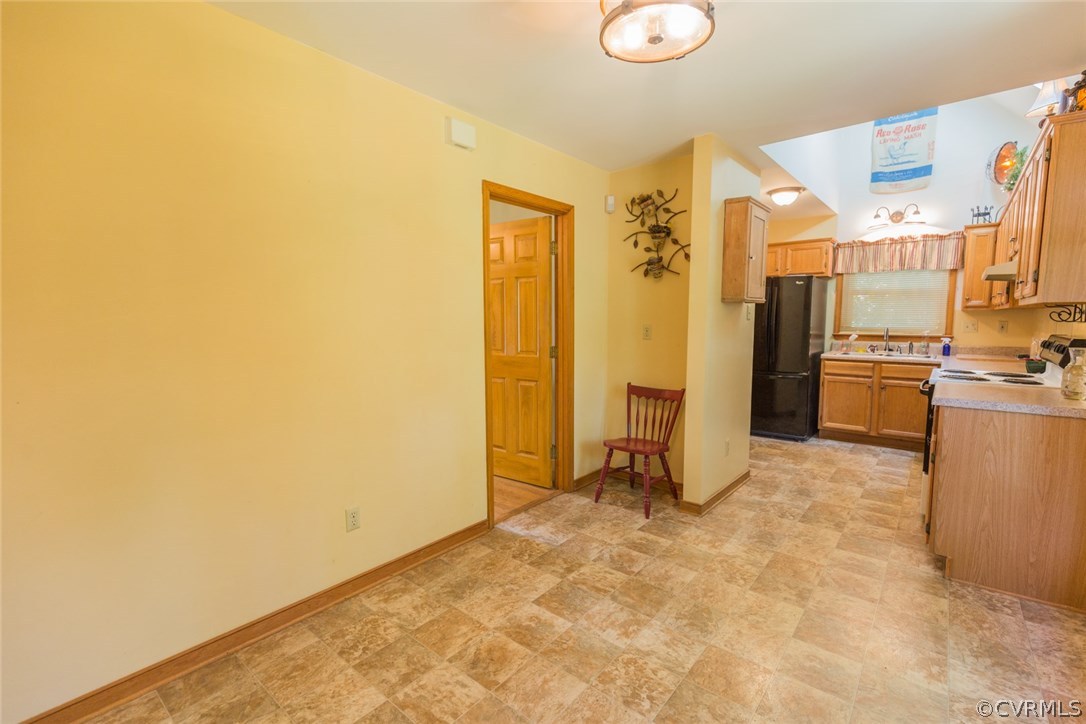 6202 Husting Road Chesterfield, VA 23832 - Photo 15 of 50 a view of a kitchen with refrigerator and windows
