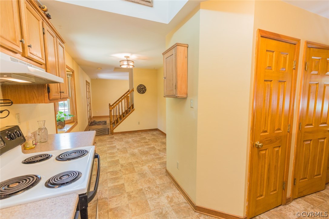 6202 Husting Road Chesterfield, VA 23832 - Photo 20 of 50 a view of a hallway with furniture and floor to ceiling window