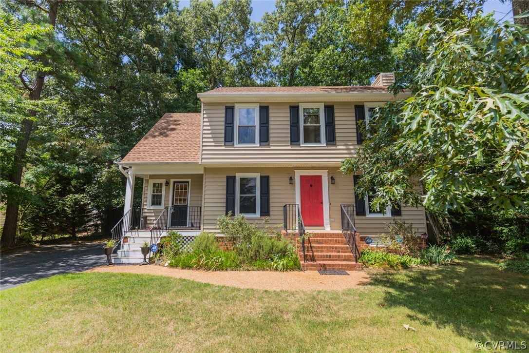 6202 Husting Road Chesterfield, VA 23832 - Photo 2 of 50 a front view of a house with a yard