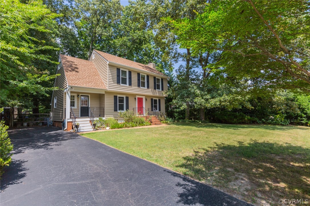 6202 Husting Road Chesterfield, VA 23832 - Photo 3 of 50 a front view of a house with a yard