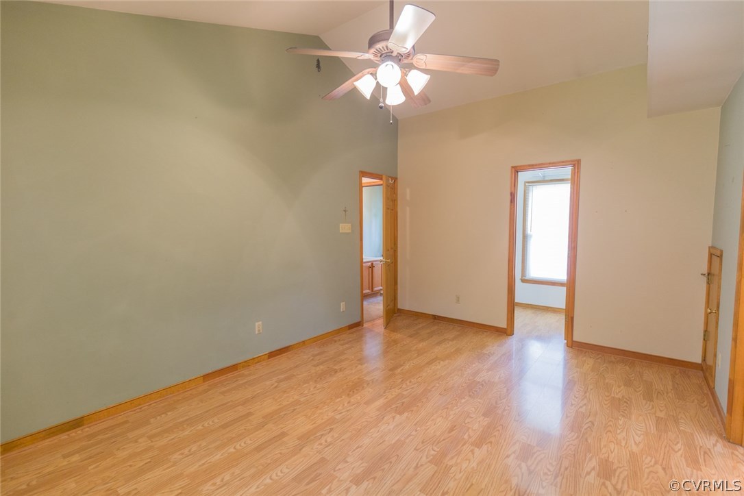 6202 Husting Road Chesterfield, VA 23832 - Photo 32 of 50 an empty room with wooden floor chandelier fan and windows