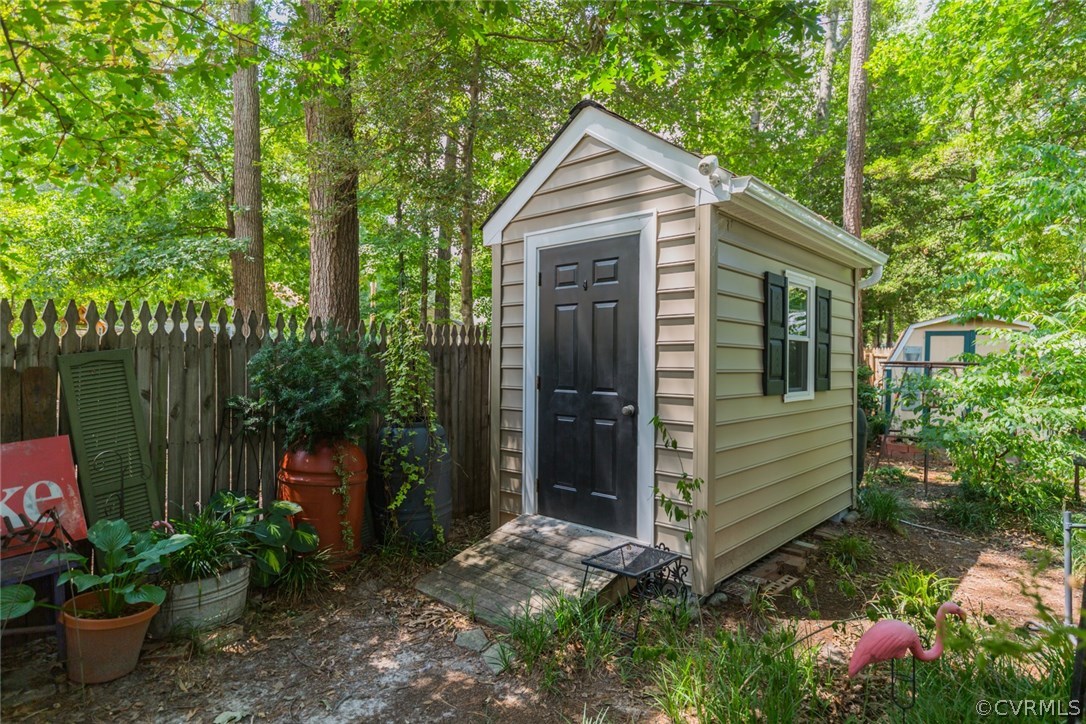 6202 Husting Road Chesterfield, VA 23832 - Photo 40 of 50 a view of a house with a yard and potted plants