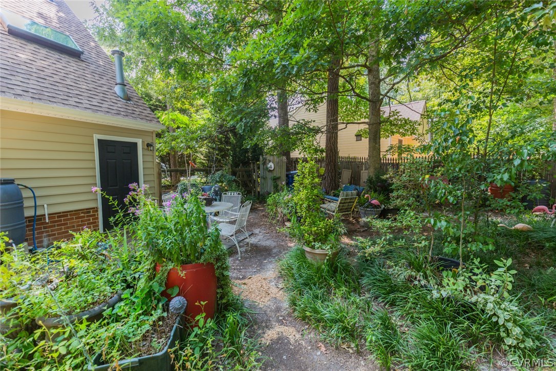 6202 Husting Road Chesterfield, VA 23832 - Photo 41 of 50 a view of a garden with large trees
