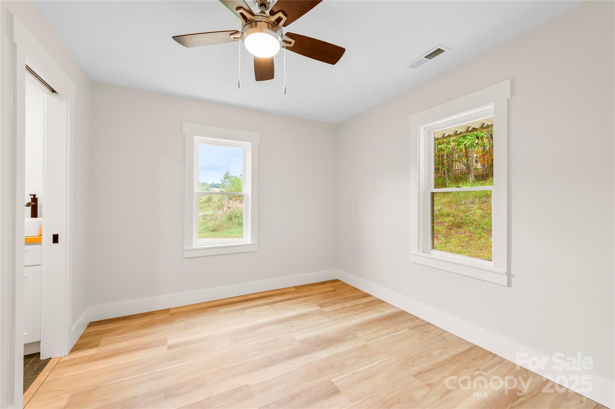 421 Hazel Brook Road Marshall, NC 28753 - Photo 16 of 30 a view of an empty room with a window