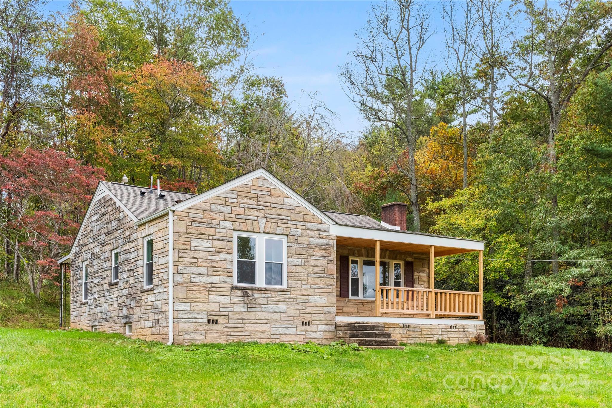 421 Hazel Brook Road Marshall, NC 28753 - Photo 2 of 30 front view of a house with a yard