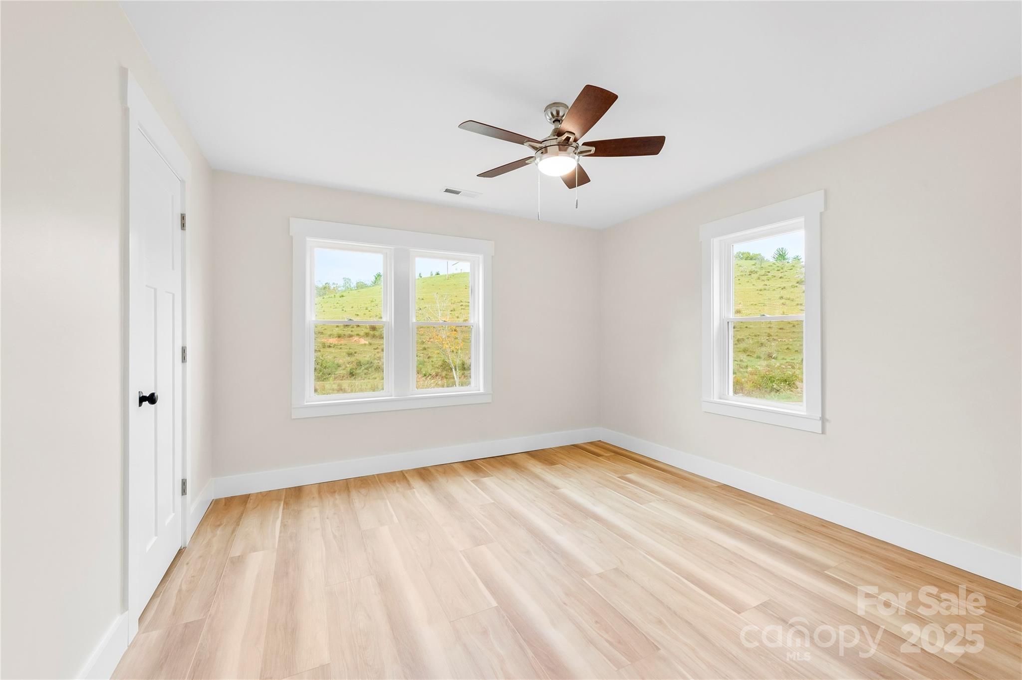 421 Hazel Brook Road Marshall, NC 28753 - Photo 22 of 30 a view of an empty room and window