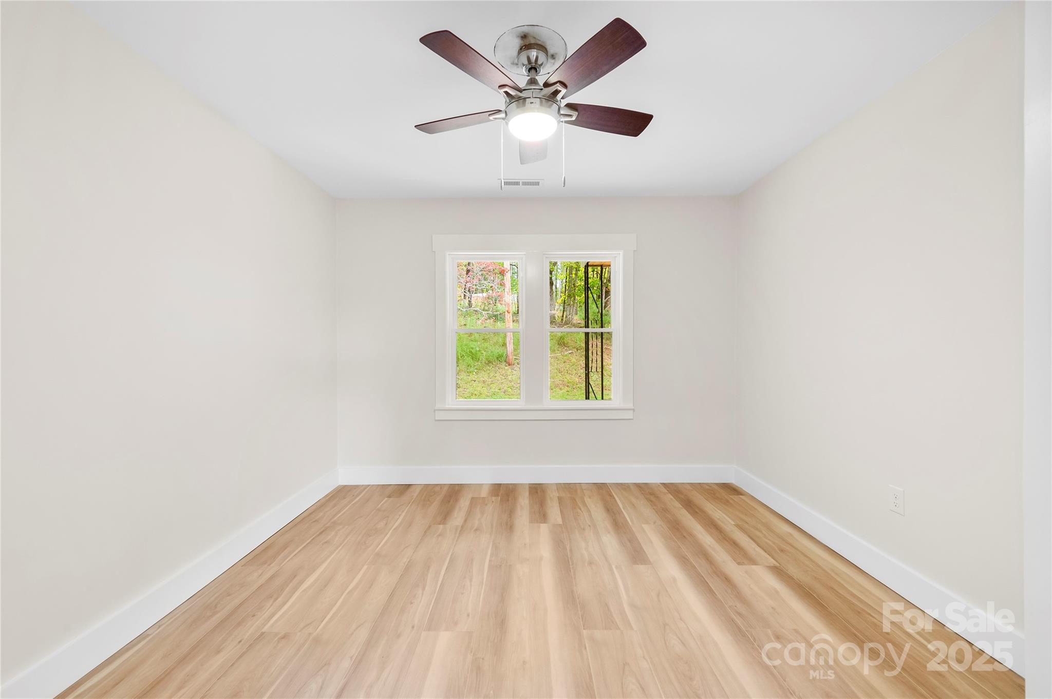 421 Hazel Brook Road Marshall, NC 28753 - Photo 27 of 30 a view of an empty room with a window