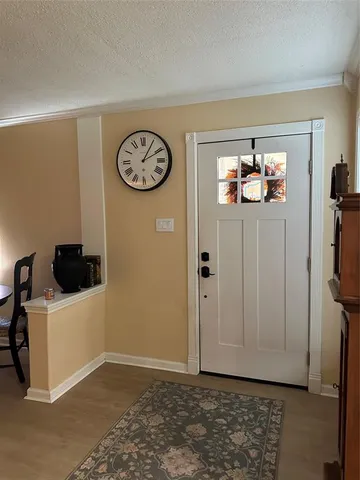 a view of a storage & utility room with a window