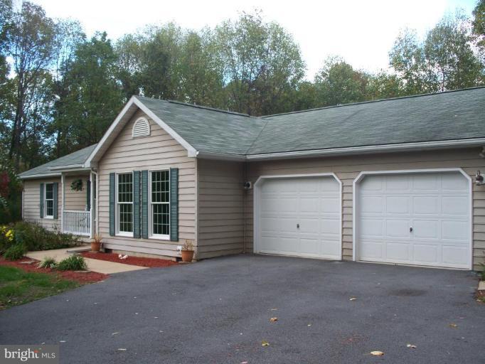 94 Canal Road Falling Waters, WV 25419 - Photo 2 of 29 Garage 1