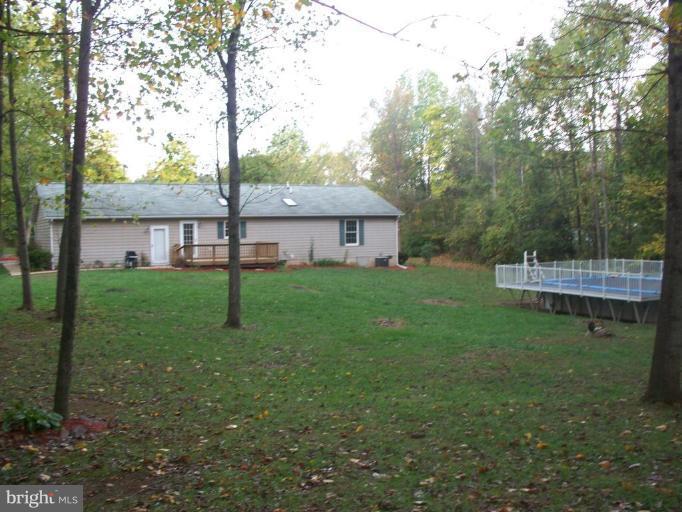 94 Canal Road Falling Waters, WV 25419 - Photo 26 of 29 Back yard