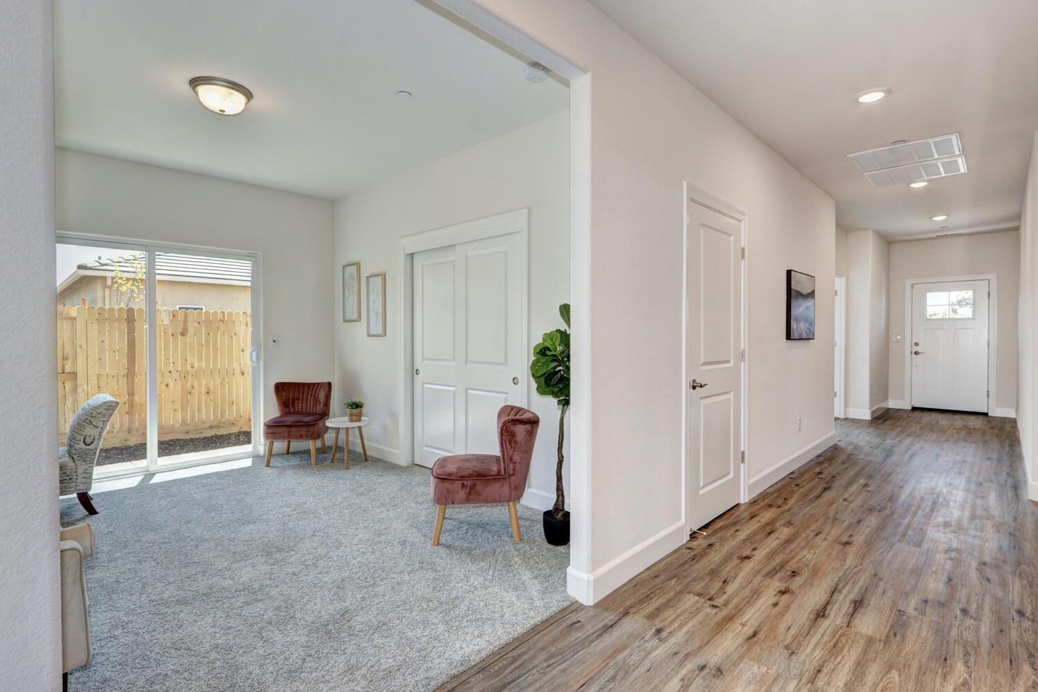 932 Norman Road Galt, CA 95632 - Photo 4 of 21 a living room with furniture and a wooden floor