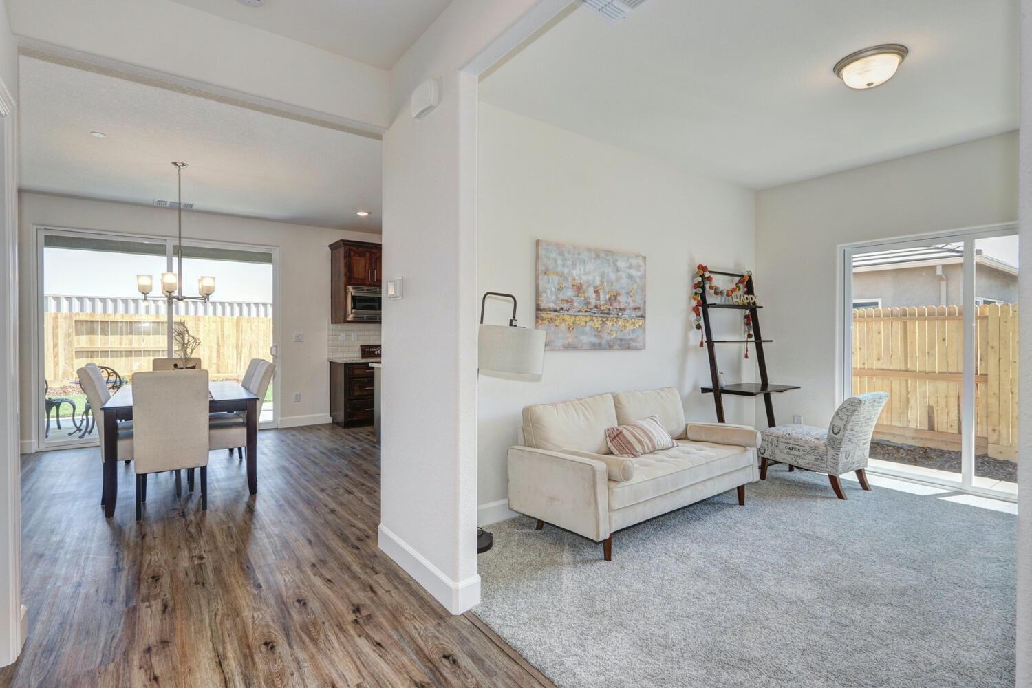 932 Norman Road Galt, CA 95632 - Photo 5 of 21 a living room with furniture and a wooden floor