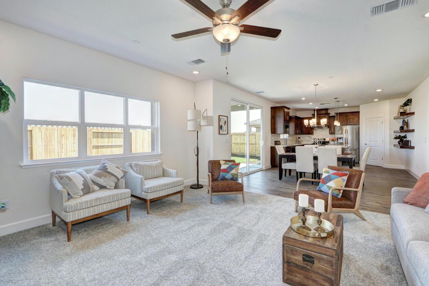 932 Norman Road Galt, CA 95632 - Photo 10 of 21 a living room with furniture and a large window