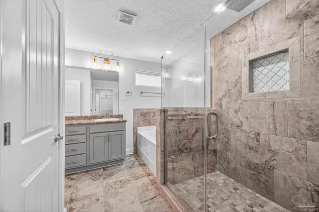 a bedroom with furniture and a couch