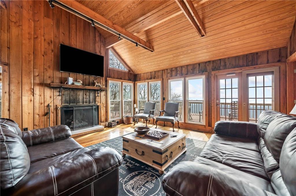 1474 Deer Run Ridge Jasper, GA 30143 - Photo 13 of 50 a living room with furniture fireplace and flat screen tv