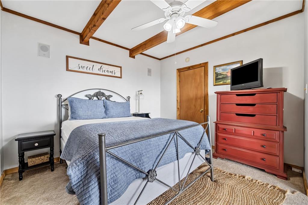 1474 Deer Run Ridge Jasper, GA 30143 - Photo 43 of 50 a bedroom with a bed and a television