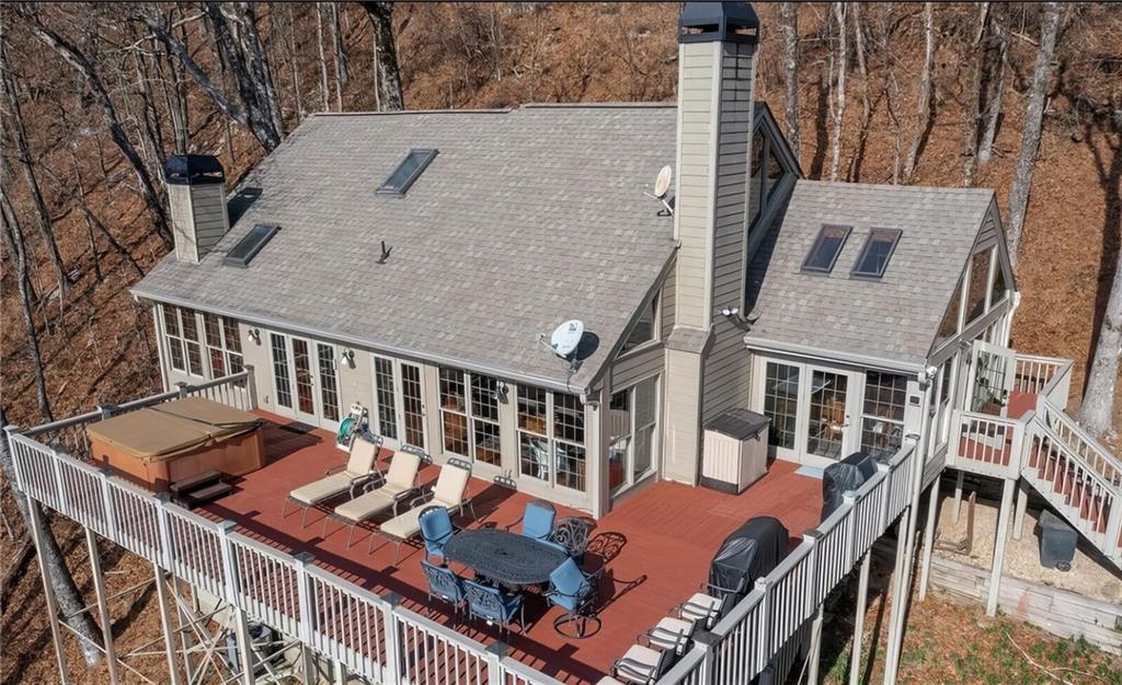 1474 Deer Run Ridge Jasper, GA 30143 - Photo 48 of 50 a view of a patio with a table and chairs