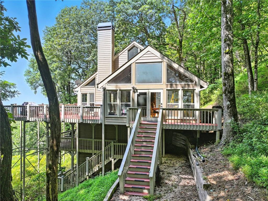 1474 Deer Run Ridge Jasper, GA 30143 - Photo 5 of 50 a front view of a house with a yard