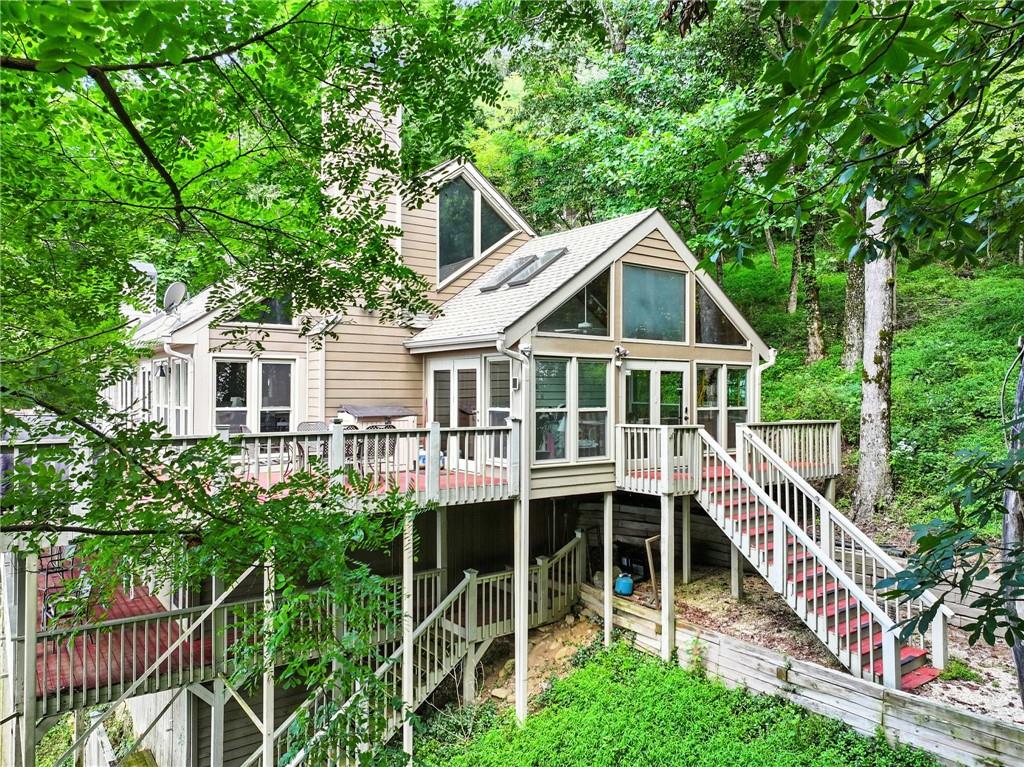 1474 Deer Run Ridge Jasper, GA 30143 - Photo 6 of 50 a view of a house with a yard