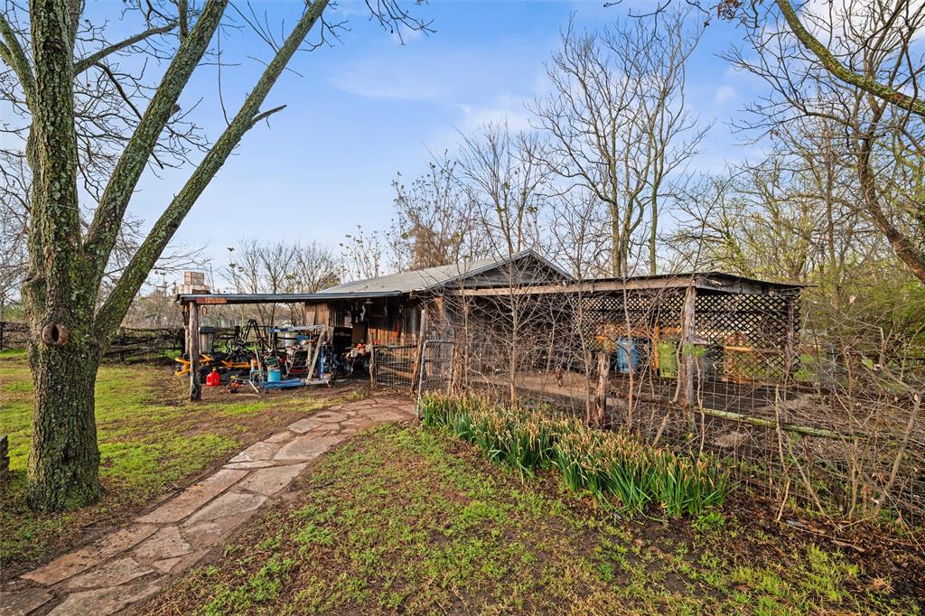 308 Carroll Street Aledo, TX 76008 - Photo 23 of 29 Large Workshop with attached 2 car carport