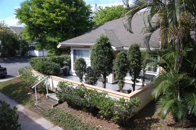 a view of a backyard with plants