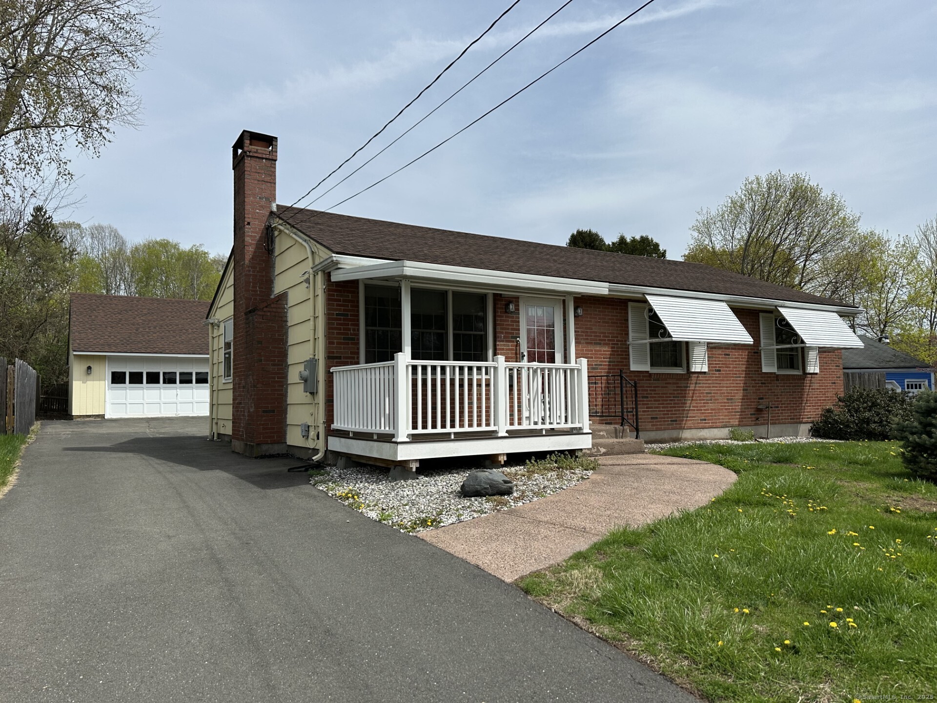 Front view with two car garage.