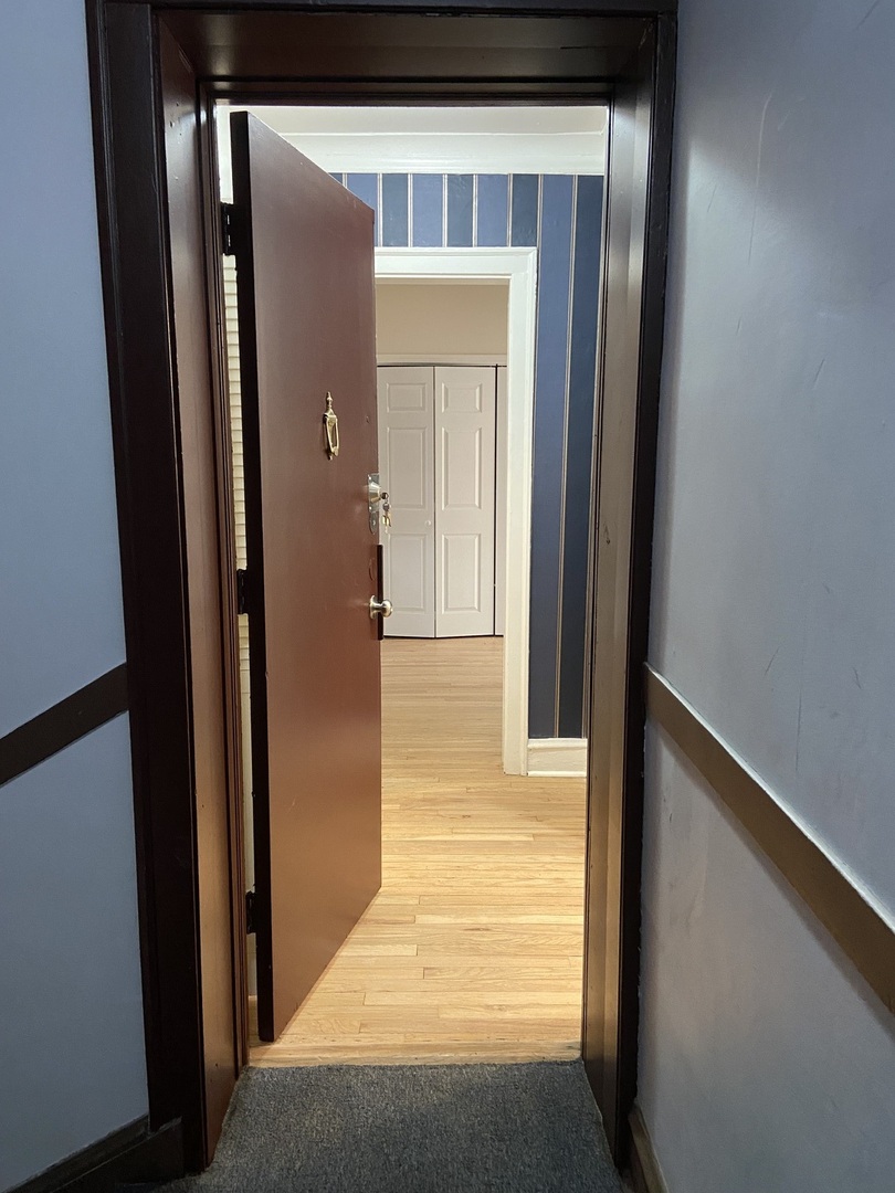 2210 East 70th Street, Unit 1 Chicago, IL 60649 - Photo 2 of 15 a view of a front door