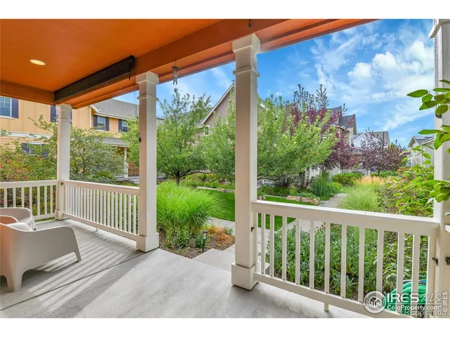 a balcony with chairs