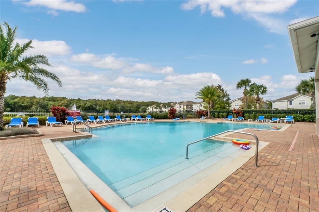 6458 South Goldenrod Road, Unit 29B Orlando, FL 32822 - Photo 35 of 40 a view of swimming pool from a terrace