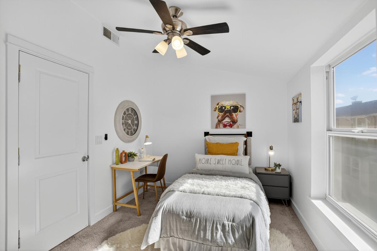 236 Grayson Terrace San Jose, CA 95126 - Photo 15 of 40 a bedroom with a bed and a chandelier