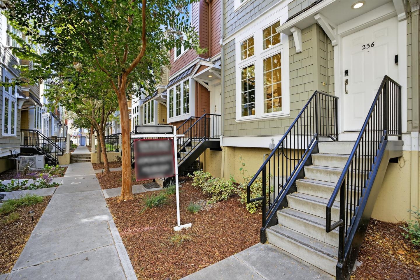 236 Grayson Terrace San Jose, CA 95126 - Photo 25 of 40 a view of a brick house with a small yard
