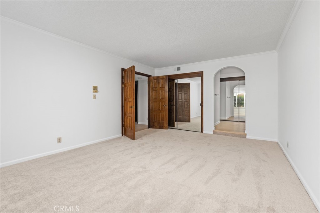 6200 Riviera Circle Long Beach, CA 90815 - Photo 17 of 35 an empty room with windows and bathroom