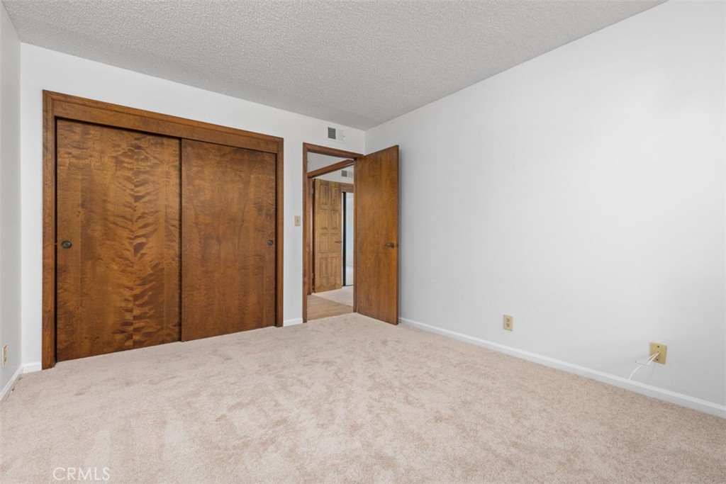 6200 Riviera Circle Long Beach, CA 90815 - Photo 22 of 35 a view of a room with a wooden wall
