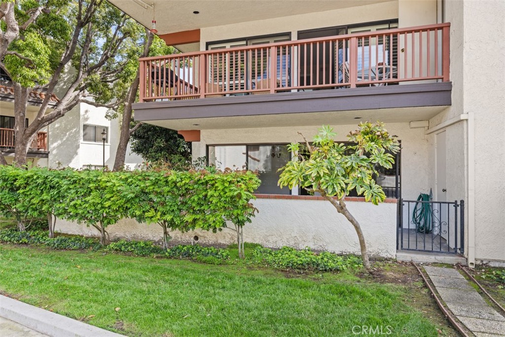 6200 Riviera Circle Long Beach, CA 90815 - Photo 27 of 35 a house with swimming pool in front of it