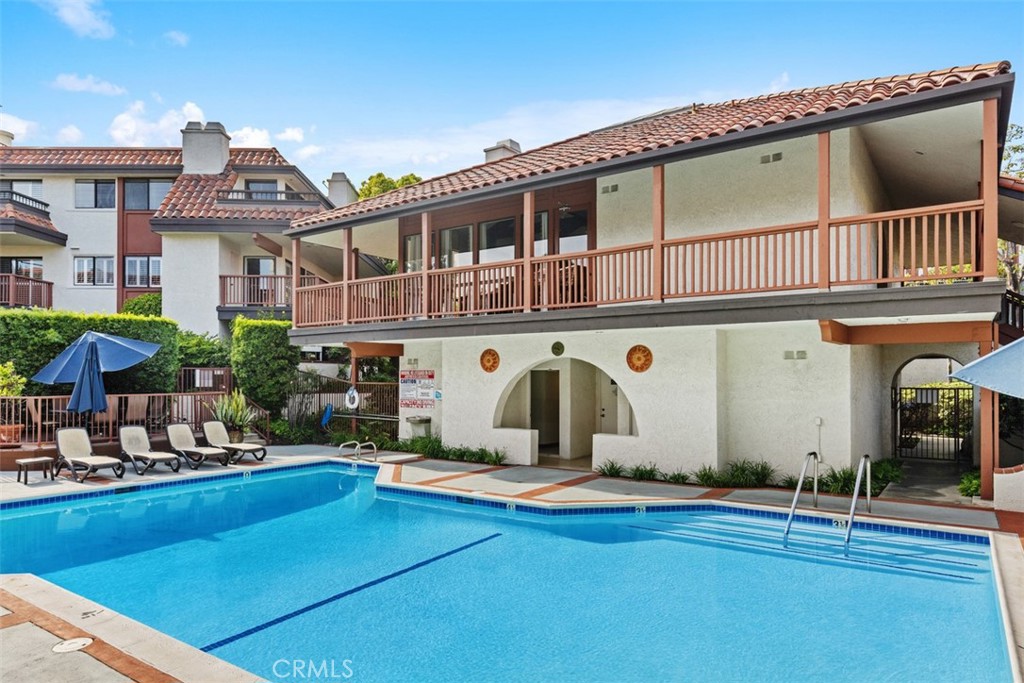 6200 Riviera Circle Long Beach, CA 90815 - Photo 33 of 35 a front view of a house with swimming pool
