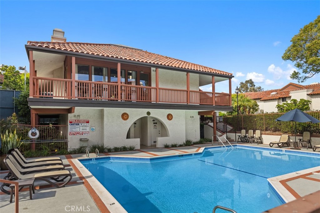 6200 Riviera Circle Long Beach, CA 90815 - Photo 34 of 35 a front view of a house with swimming pool