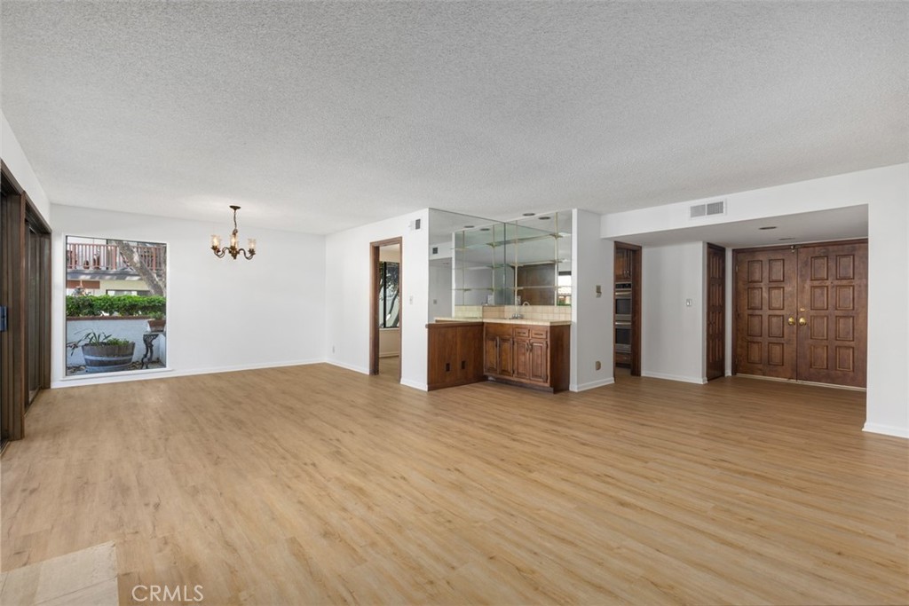 6200 Riviera Circle Long Beach, CA 90815 - Photo 4 of 35 a view of a kitchen with a sink and a window