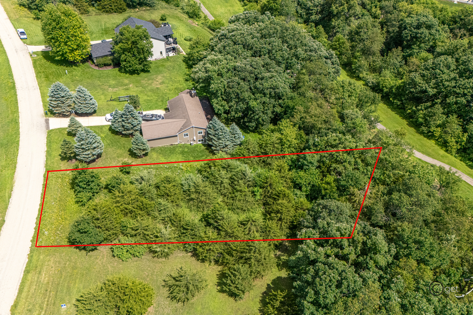 11-a70 Fairway Drive Apple River, IL 61001 - Photo 2 of 5 an aerial view of residential house with outdoor space and trees all around