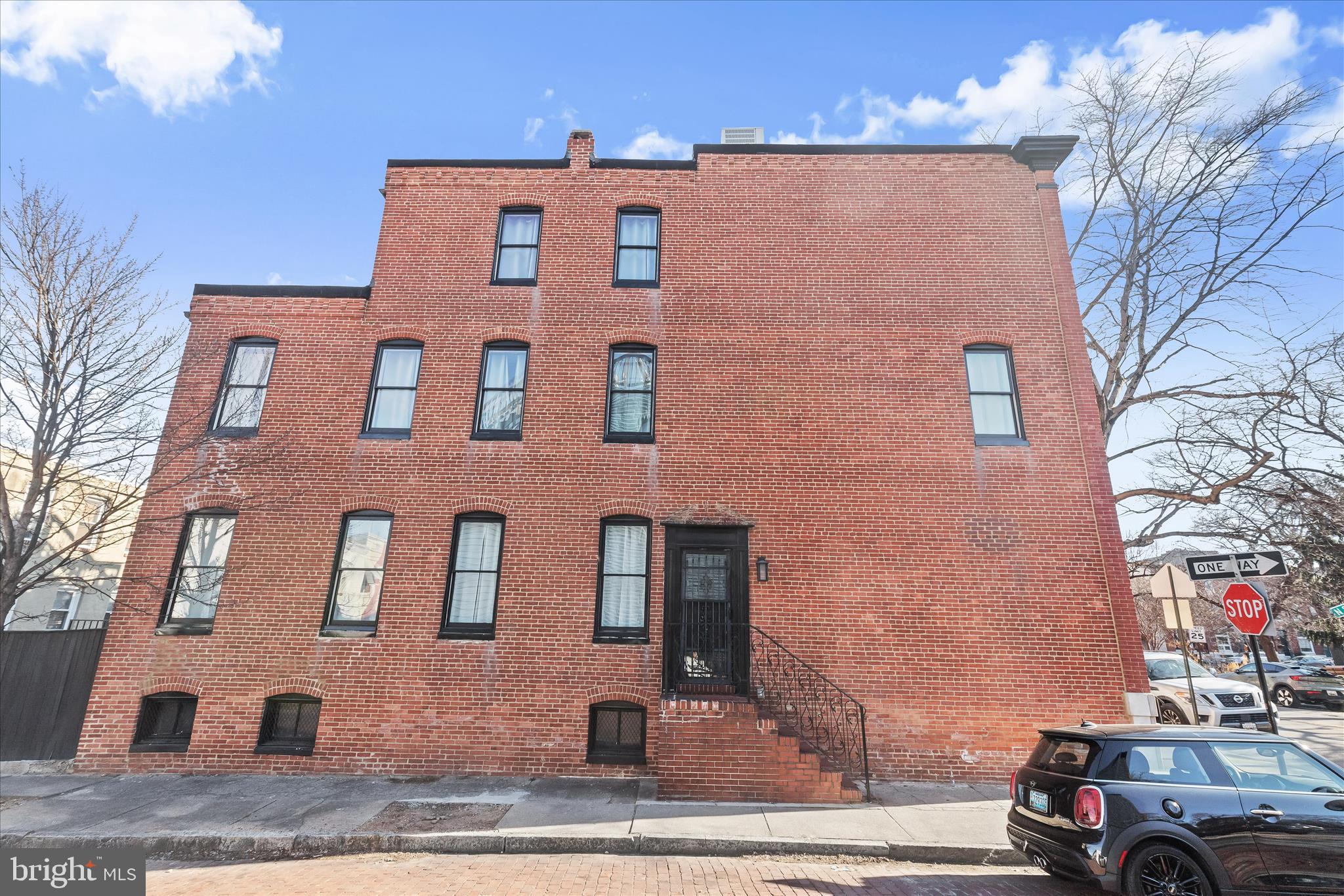 2820 East Baltimore Street Baltimore, MD 21224 - Photo 33 of 45 a front view of a house with parking