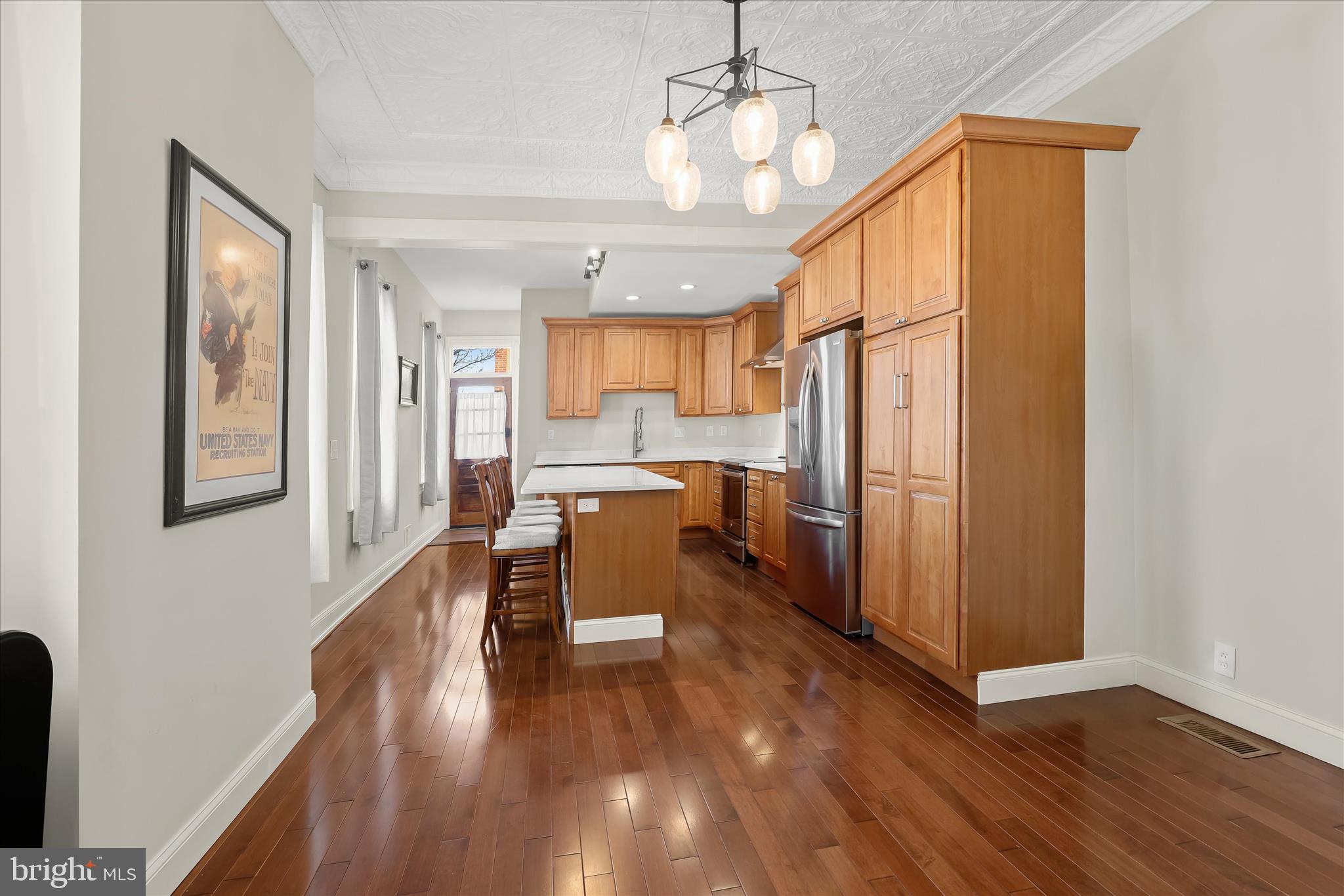 2820 East Baltimore Street Baltimore, MD 21224 - Photo 10 of 45 a view of a dining room with furniture window and wooden floor